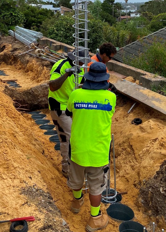 Image of our contiguous hand piling team working on a home in Sydney