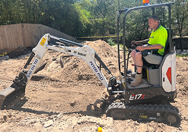 image of our team member doing excavation work